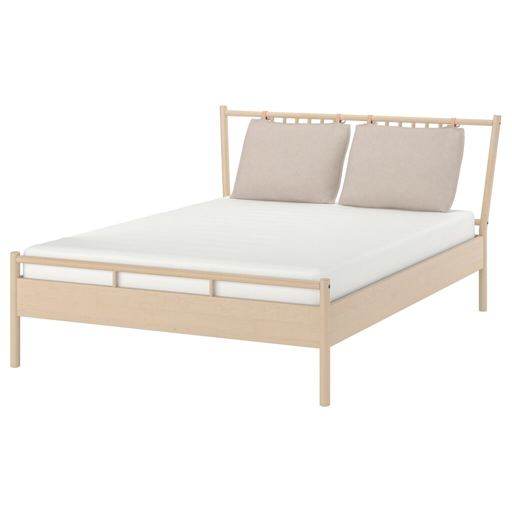 IKEA bed assembly with SKORVA midbeam – parts laid out